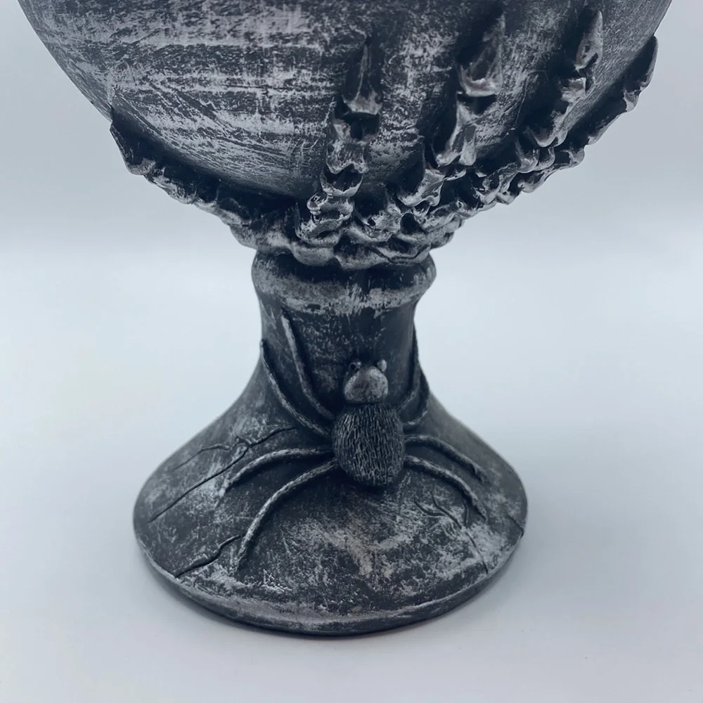 Halloween decorative skulls bones and spider chalice